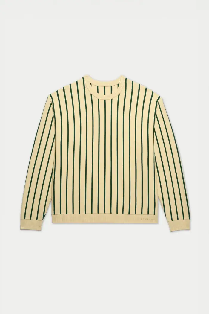 Cream and navy striped sweater, flat lay