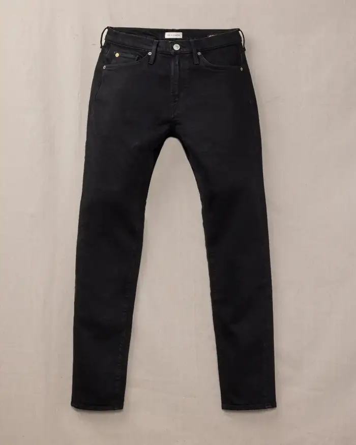 Black denim jeans, flat lay